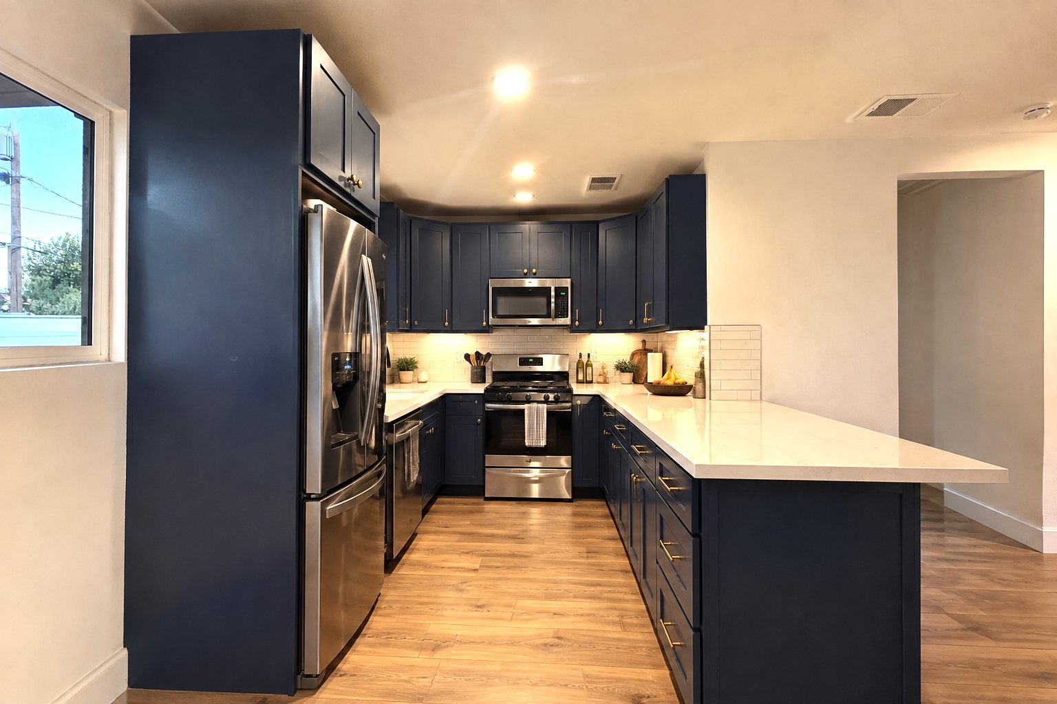 Navy Kitchen Remodel by KOZAK Ukrainian Services LLC project photo