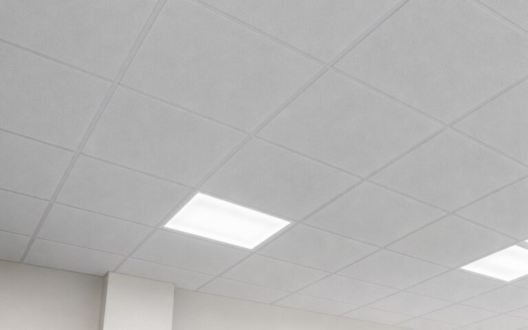 White drop ceiling with recessed light panels