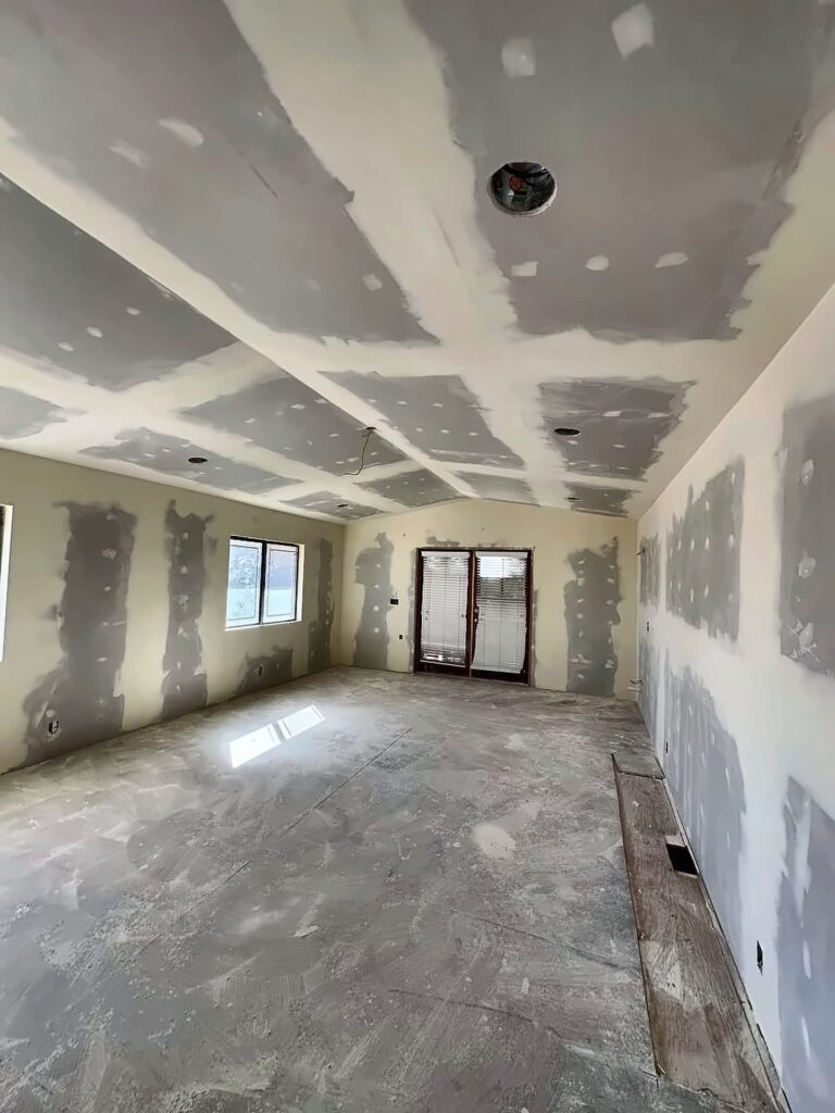 Taped and mudded drywall walls and ceiling