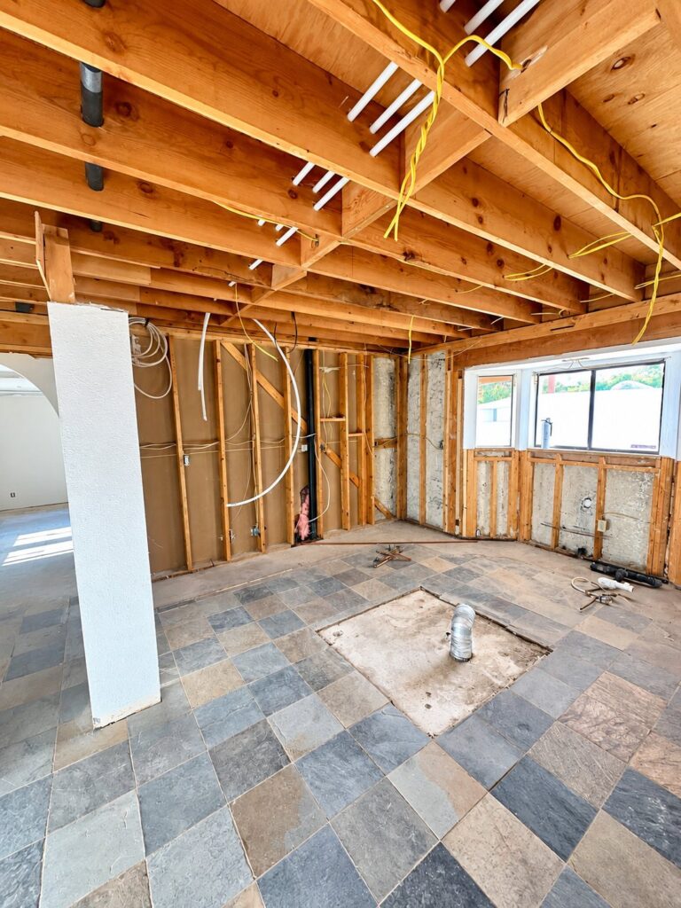 Room opened up to the framing and joists for renovation