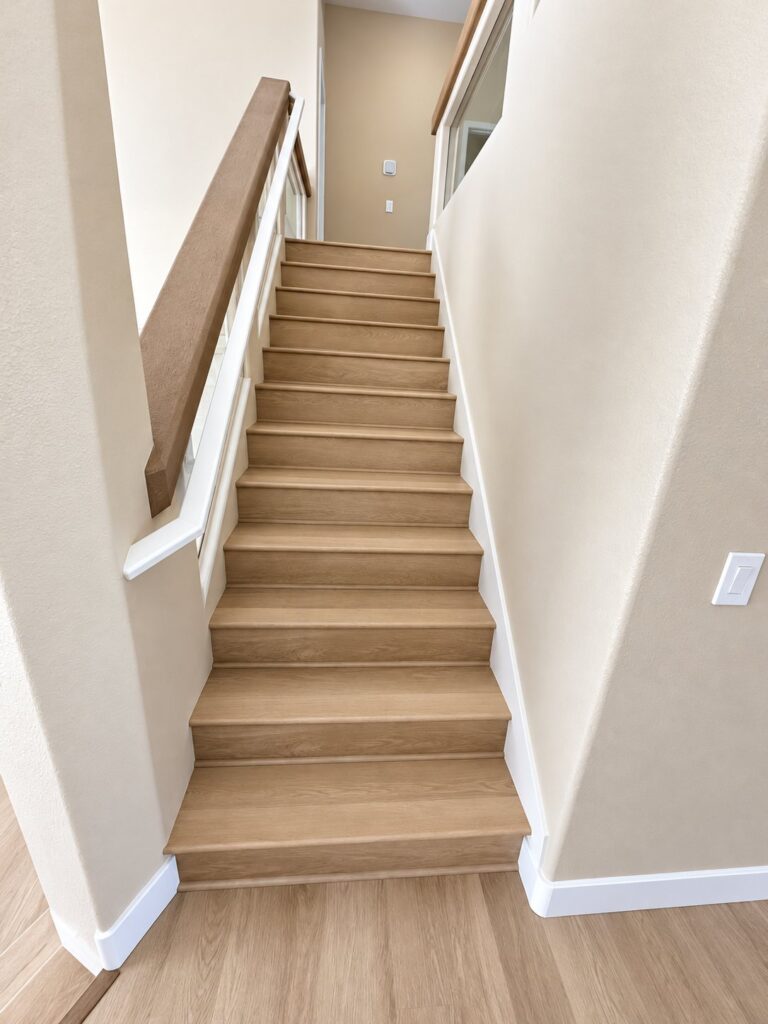 Long staircase with light oak treads