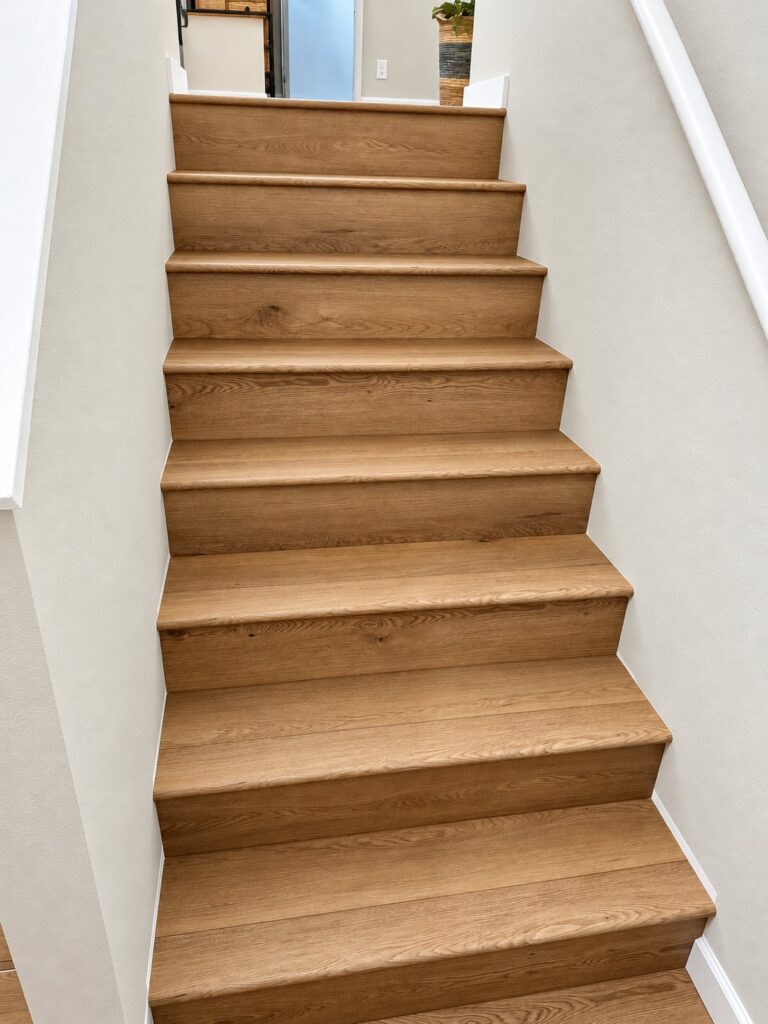 Staircase with oak-look treads and white risers