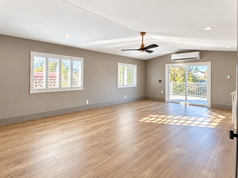 Bedroom with oak flooring and a balcony door