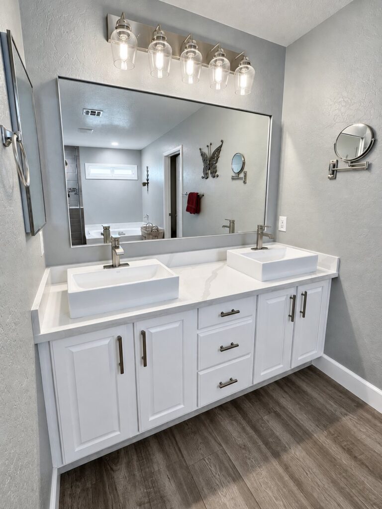 Double vanity with vessel sinks and new lighting