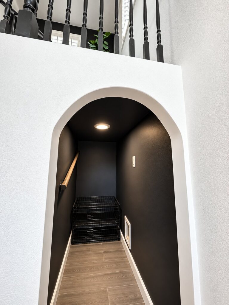 Under-stair storage nook with lighting