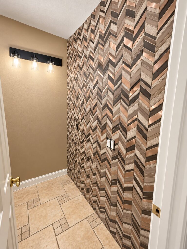 Laundry room with a chevron wood-look tile accent wall