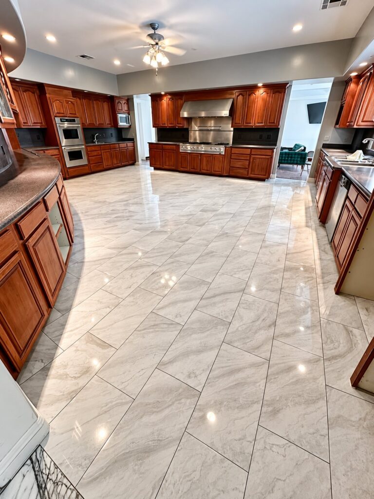 Kitchen with large polished porcelain floor tile